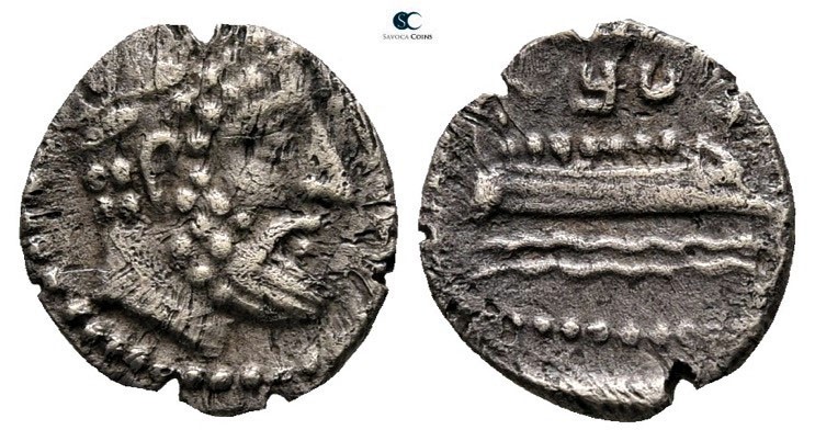 Phoenicia. Arados circa 380-350 BC. 
Obol AR

9mm., 0,53g.

Laureate head o...