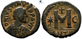Justin I AD 518-527. Struck AD 522-527. Antioch. Uncertain officina. Follis Æ