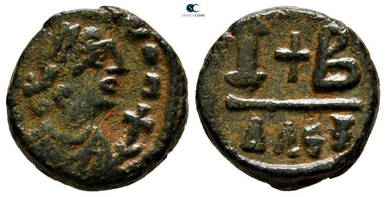 Tiberius II Constantine AD 578-582. Alexandria
12 Nummi Æ

15mm., 3,84g.

I...