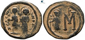 Maurice Tiberius with Constantina and Theodosius AD 582-602. Struck AD 596-602. Cherson. Follis Æ