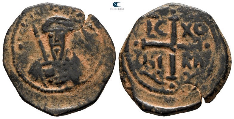 Tancred AD 1101-1112. Antioch
Follis Æ

21mm., 3,58g.

Illegible inscriptio...