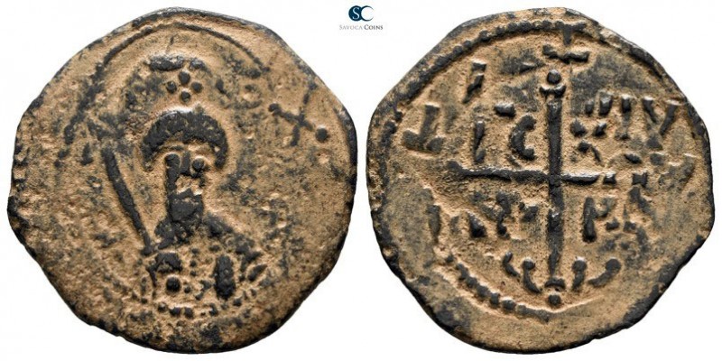 Tancred AD 1101-1112. Antioch
Follis Æ

23mm., 4,11g.

Illegible inscriptio...