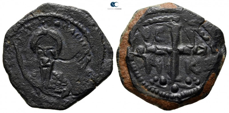 Tancred AD 1101-1112. Antioch
Follis Æ. Second type

21mm., 4,29g.

Illegib...