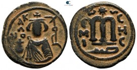 Time of `Abd al-Malik ibn Marwan AD 685-705. (AH 65-86). Imperial bust type (Type VII). Struck circa AD 685-690s. Hims (Emesa) mint. Fals Æ