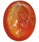 ROMA. Entalle. Siglo III d.C. Con representación de una cabeza masculina. Cornalina. Altura 10 mm.