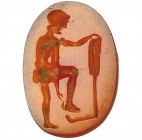 ROMA. Entalle. Siglo III d.C. Representación de figura masculina con timón y un pie sobre la proa. Cornalina. Altura. 15 mm.