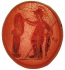 ROMA. Entalle. Siglo III d.C. Representación de Minerva con escudo y lanza inscribiendo un escudo posado sobre columna. Cornalina. Altura 14 mm.
