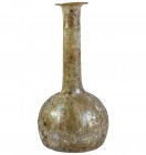 ROMA. Ampolla con irisaciones. Siglo II-III d.C. Vidrio. Altura 20,0 cm.