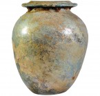 ROMA. Urna cineraria con irisaciones. Siglo I-II d.C. Vidrio. Altura 25,0 cm.