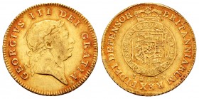 United Kingdom. George III. 1/2 guinea. 1813. (Km-651). Au. 4,14 g. Bonito color. VF. Est...120,00.