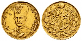 Iran. Naser al-Din Shah Qajar. 1 toman (10.000 dinares). 1305 H (1887/8). Teherán. (Km-933). Au. 2,83 g. This piece was used as a jewell. Scarce. VF. ...
