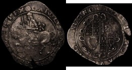 Halfcrown Charles I Exeter Mint, the shield with five short and two long scrolls, Walking horse, King's sash tied in a large bow. S.3065 mintmark Rose...
