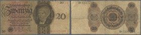 Deutschland - Deutsches Reich bis 1945. 20 Reichsmark 1924, Ro.169, stark gebarucht mit Einrissen und kleinen Fehlstellen am oberen Rand. Erhaltung: V...