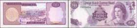 CAYMAN ISLANDS. Cayman Islands Currency Board. 40 Dollars, 1974. P-9. Uncirculated.
Lovely purple ink is seen on this 40 Dollar note.
Estimate: $80....