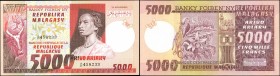 MADAGASCAR. Banky Foiben'ny Repoblika Malagasy. 5000 Francs, 1974-75. P-66a. About Uncirculated.
A flurry of colors is found on this high denominatio...