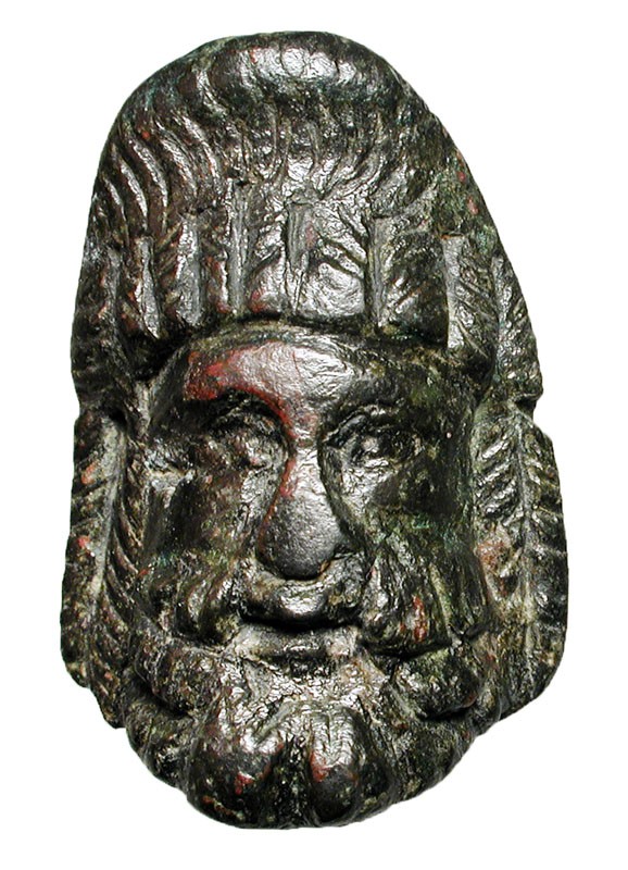 Bronze Bearded Head Applique. Roman, 2nd-4th Century A.D. Bronze applique head o...