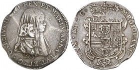 1666. Carlos II. Milán. 1 felipe. (Vti. 18) (MIR 380). 27,66 g. Leve defecto de cospel. Atractiva. Muy escasa. MBC+.