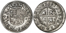 1718. Felipe V. Sevilla. M. 2 reales. (AC. 977). 6,22 g. Rosetas de 5 pétalos acotando el escudo. Buen ejemplar. Ex Colección Javier Verdejo Sitges. E...
