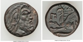 CIMMERIAN BOSPORUS. Panticapaeum. 4th century BC. AE (19mm, 6.51 gm, 12h). XF. Head of bearded Pan right / Π-A-N, forepart of griffin left, sturgeon l...