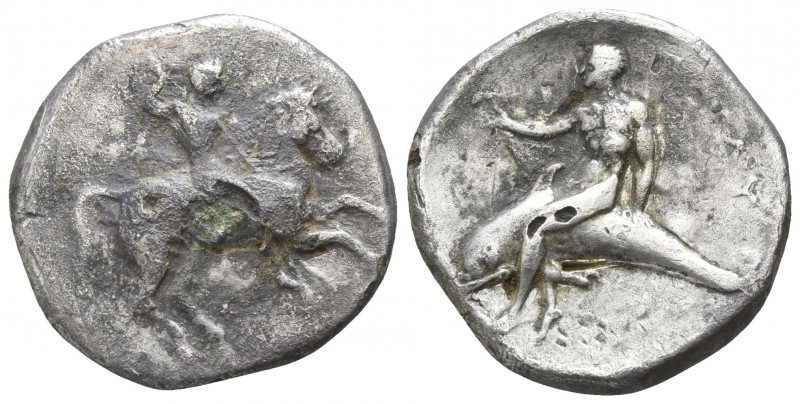 Calabria. Tarentum 332-302 BC.
Nomos AR

22mm., 5,34g.

Naked horseman gall...