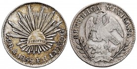 México. 2 reales. 1859. México. FH. (Km-374.10). Ag. 6,65 g. Rayita en anverso. MBC+. Est...35,00.