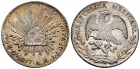 México. 8 reales. 1877. Oaxaca. AE. (Km-377.11). Ag. 27,01 g. Ligera pátina en anverso y brillo original. EBC+. Est...100,00.