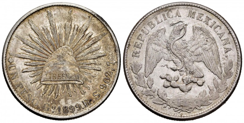 México. 1 peso. 1899. Guanajuato. RS. (Km-409.1). Ag. 27,13 g. Parte de brillo o...