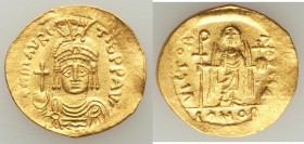 Maurice Tiberius (AD 582-602). AV solidus (21mm, 3.76 gm, 6h). Choice XF, clipped. Constantinople, 4th officina. o N mAVRC-TIb PP AVG, draped and cuir...