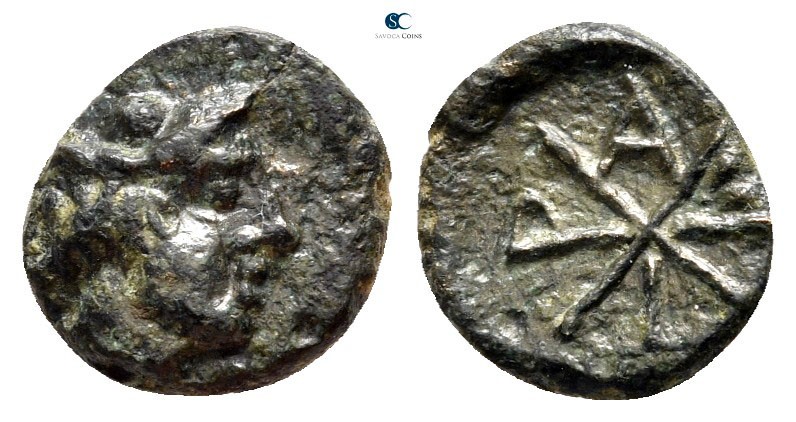 Macedon. Tragilos 420-400 BC. Not in HGC
Bronze Æ

11mm., ,85g.



very f...