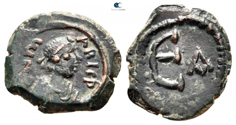 Maurice Tiberius AD 582-602. Constantinople
Pentanummium Æ

17mm., 2,08g.

...
