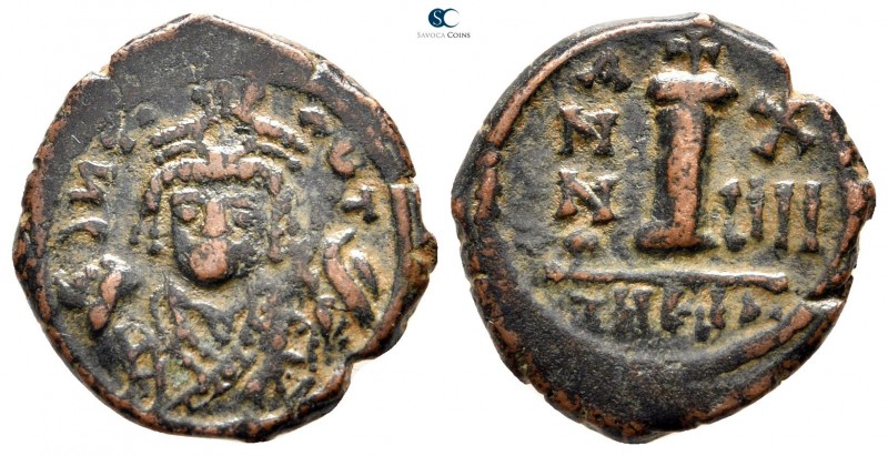 Maurice Tiberius AD 582-602. Theoupolis (Antioch)
Decanummium Æ

17mm., 3,26g...