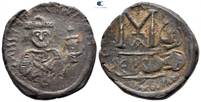 Heraclius with Heraclius Constantine AD 610-641. overstruck on a Follis of Justi...