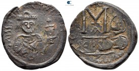Heraclius with Heraclius Constantine AD 610-641. overstruck on a Follis of Justin II and Sophia. Cilicia Isauriae. Follis Æ