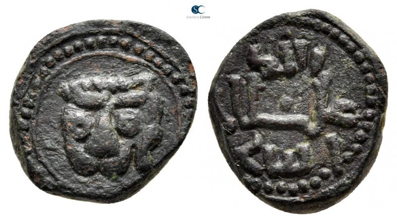 William II AD 1166-1189. Messina
Follaro Æ

13mm., 2,03g.



very fine