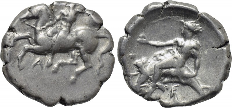 CALABRIA. Tarentum. Nomos (Circa 280 BC). 

Obv: Nude youth, holding shield, o...