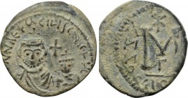 HERACLIUS, with HERACLIUS CONSTANTINE (610-641). Follis. Seleucis Isauriae. Uncertain date.