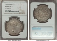Republic Souvenir Peso 1898 AU Details (Cleaned) NGC, KM-XM15. Mintage: 1,000. A lesser-circulated selection retaining the majority of its struck deta...