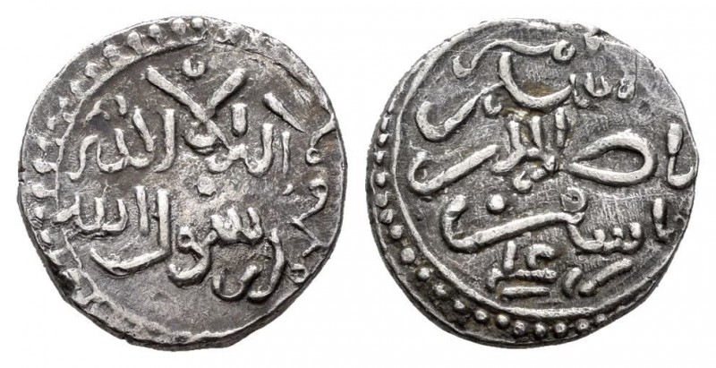 Almorávides. Texufin ibn Ali. Quirate. Sin ceca. (Vives-1882). Ag. 0,98 g. EBC. ...