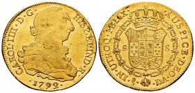 Carlos IV (1788-1808). 8 escudos. 1792. Santiago. DA. (Cal 2019-1757). Au. Busto de Carlos III y ordinal IIII. Hojitas en anverso. Brillo original. MB...