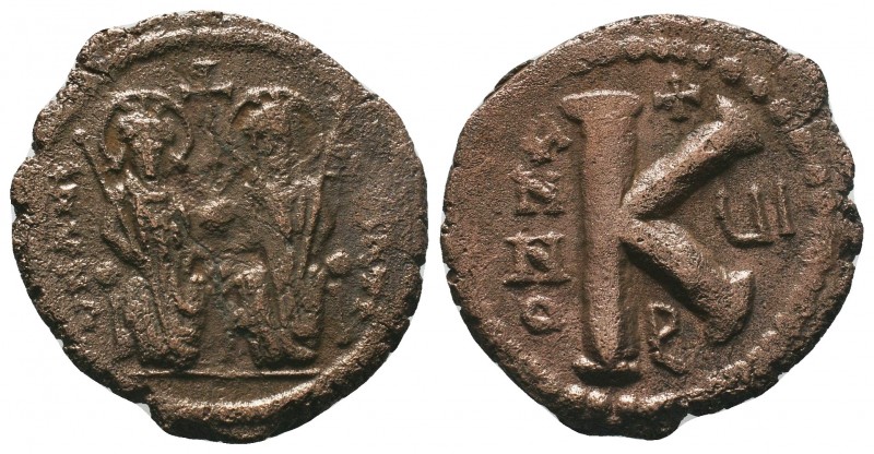 Justin II , with Sophia (565-578 AD). AE Half Follis

Condition: Very Fine

Weig...