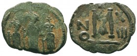 ARAB-BYZANTINE: Three Standing Figures, ca. 640, AE fals 

Condition: Very Fine

Weight:5.50 gr
Diameter: 26 mm