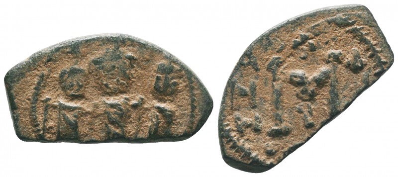 ARAB-BYZANTINE: Three Standing Figures, ca. 640, AE fals 

Condition: Very Fine
...