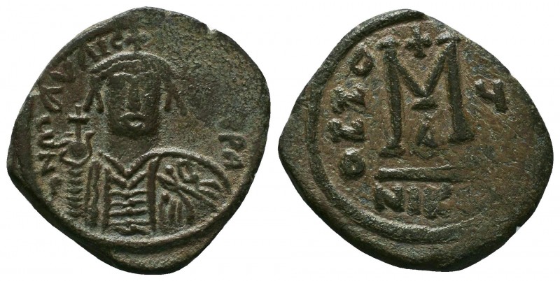 Maurice Tiberius. 582-602. Æ Follis 
Condition: Very Fine

Weight: 12.11 gr
Diam...