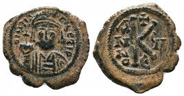 Maurice Tiberius. 582-602. Æ Half Follis 
Condition: Very Fine

Weight: 15.33 gr
Diameter: 35 mm