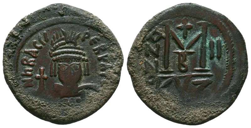 Heraclius. 610-641. Æ Follis
Condition: Very Fine

Weight: 14.04 gr
Diameter: 33...