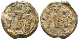 Lead seal of byzantine emperor Romanos IV Diogenes(1068-1071)
Obverse: Three full-length figures: in the center, Christ bearded wearing a tunic and hi...