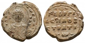 Seal of George protospatharios strategos (11th cent.)
Bust of saint Georgewith his name, circular invocative inscription/Inscription in 4lines
Conditi...