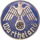 Organisationsabzeichen
Deutsche Volksliste im Warthgau Abzeichen o.J. Versilbert und emailliert. 23,5 mm Hüsken B9 02 Selten. Sehr schön
