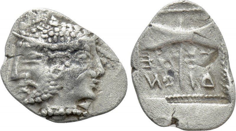 TROAS. Tenedos. Hemidrachm (Circa 525-490 BC). 

Obv: Archaic janiform male an...