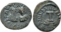 ISLAMIC. Umayyad Caliphate. Time of 'Abd al-Malik ibn Marwan (AH 65-86 / AD 685-705). Fals. Arab-Byzantine type. Tripoli mint.